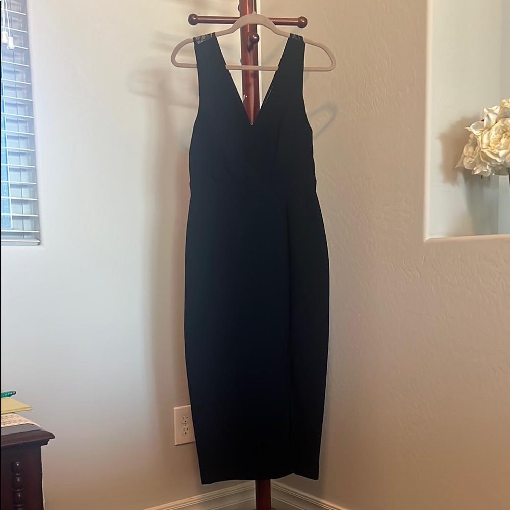Elegant Black Sleeveless Dress with lace details